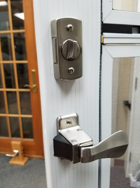 Hardware for storm doors