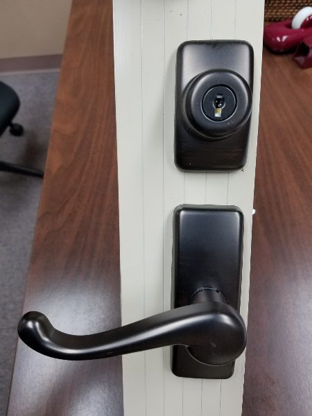Hardware for storm doors