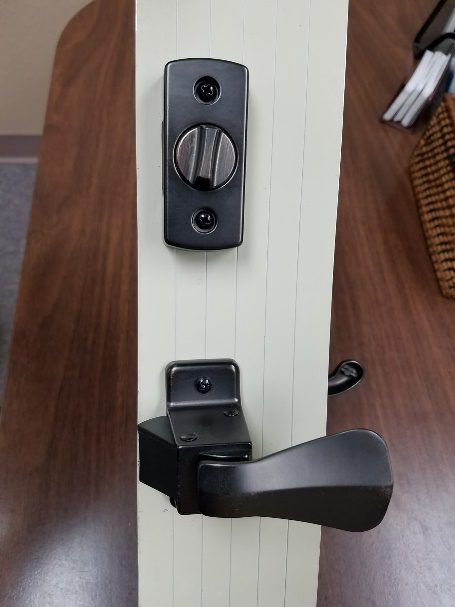 Hardware for storm doors