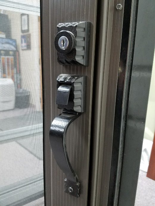 Hardware for storm doors